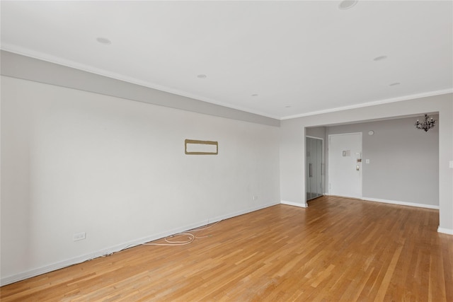 33-25 90th St Unit 3A, Jackson Heights, NY 11372 - spare room featuring light wood finished floors and ornamental molding