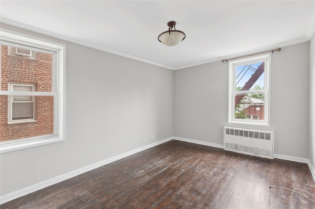 33-25 90th St Unit 3A, Jackson Heights, NY 11372 - empty room with radiator heating unit, wood finished floors, and ornamental molding