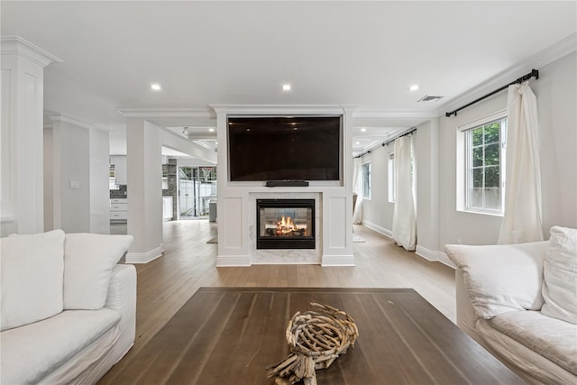 230 W Beech St, Long Beach, NY 11561 - living area featuring crown molding, a multi sided fireplace, hardwood / wood-style flooring, and recessed lighting