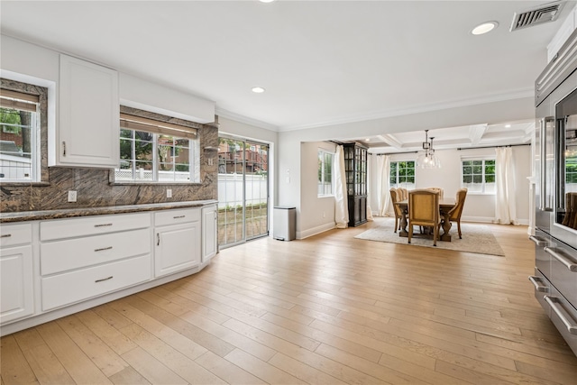 230 W Beech St, Long Beach, NY 11561 - kitchen featuring recessed lighting, crown molding, white cabinetry, backsplash, and coffered ceiling
