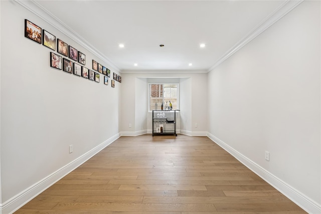 230 W Beech St, Long Beach, NY 11561 - spare room with crown molding, light wood finished floors, and recessed lighting