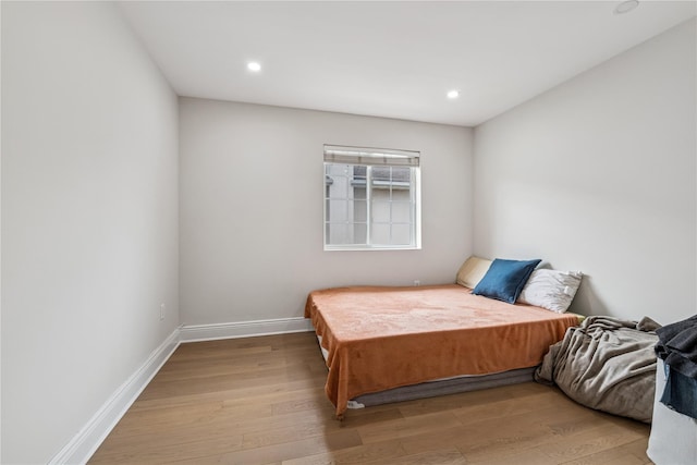 230 W Beech St, Long Beach, NY 11561 - bedroom with light wood-style flooring and recessed lighting