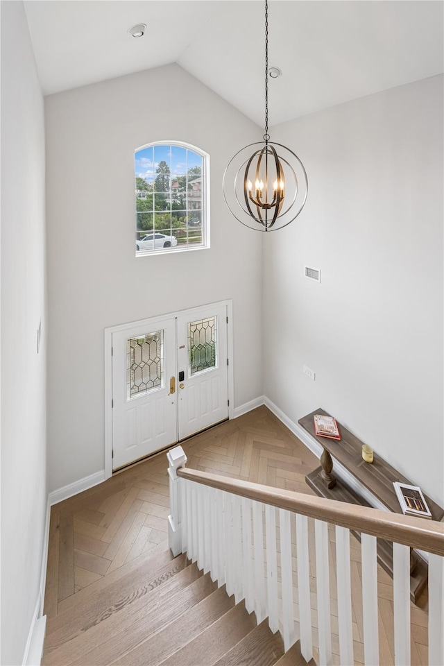 230 W Beech St, Long Beach, NY 11561 - entrance foyer featuring a chandelier and vaulted ceiling