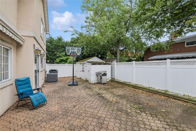 230 W Beech St, Long Beach, NY 11561 - fenced backyard with a storage shed, a patio, and grilling area