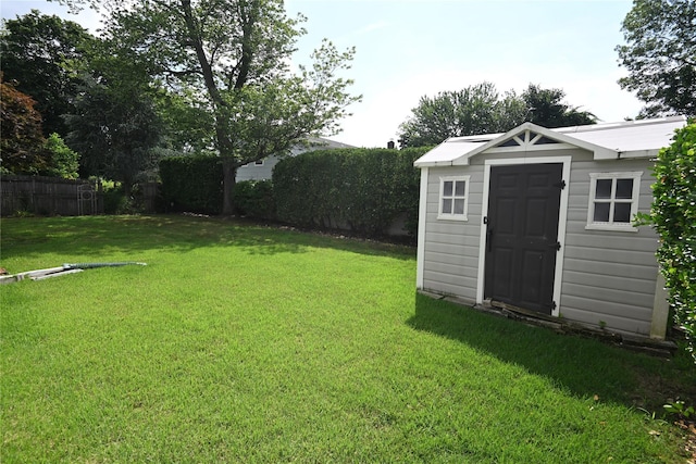 22 Victoria Rd, North Babylon, NY 11703 - view of yard featuring a storage unit