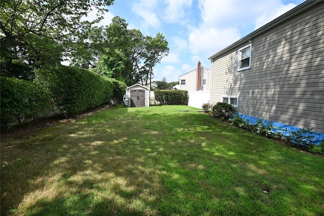 22 Victoria Rd, North Babylon, NY 11703 - view of yard with a storage shed