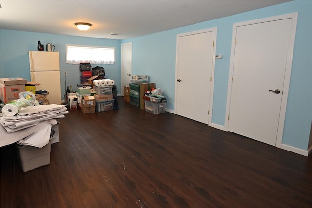 22 Victoria Rd, North Babylon, NY 11703 - miscellaneous room featuring dark wood-style floors