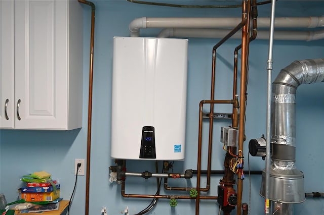 22 Victoria Rd, North Babylon, NY 11703 - utility room featuring water heater