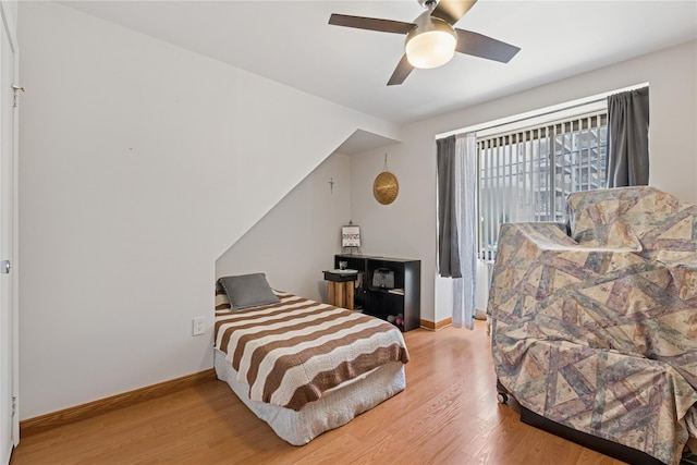 425 Shore Rd Unit 1A, Long Beach, NY 11561 - bedroom with light wood-style flooring and ceiling fan