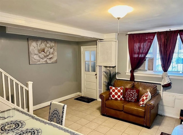 687 E 42nd St, Brooklyn, NY 11203 - living room with light tile patterned floors and stairs