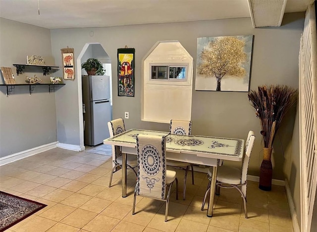687 E 42nd St, Brooklyn, NY 11203 - dining room with light tile patterned floors and baseboards