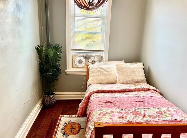687 E 42nd St, Brooklyn, NY 11203 - bedroom with wood-type flooring and baseboards