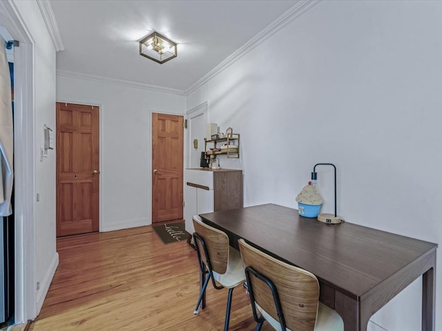102-12 65th Ave Unit D22, Forest Hills, NY 11375 - dining space with light wood-style flooring and ornamental molding