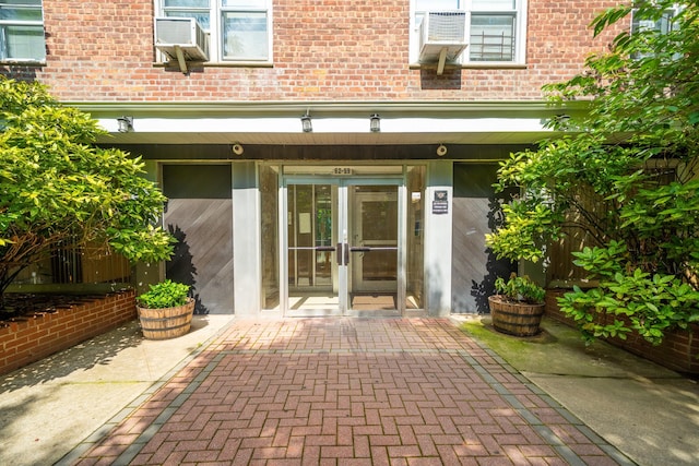 62-59 108th St Unit 4N, Forest Hills, NY 11375 - doorway to property with brick siding