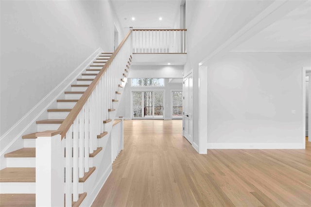 34 Old Main Rd, Quogue, NY 11959 - stairs with wood finished floors and a high ceiling