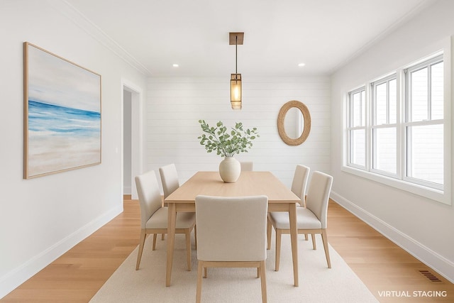 34 Old Main Rd, Quogue, NY 11959 - dining room with light wood-style flooring, crown molding, and recessed lighting