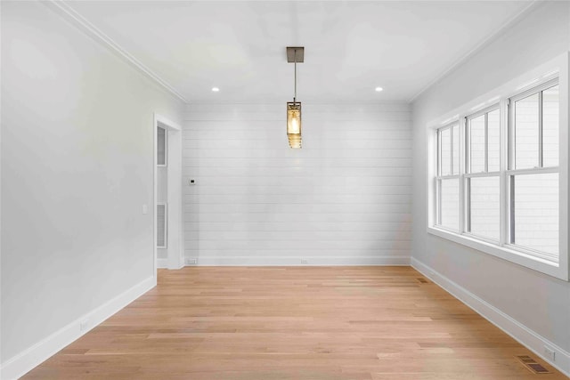 34 Old Main Rd, Quogue, NY 11959 - empty room with light wood finished floors, ornamental molding, and recessed lighting
