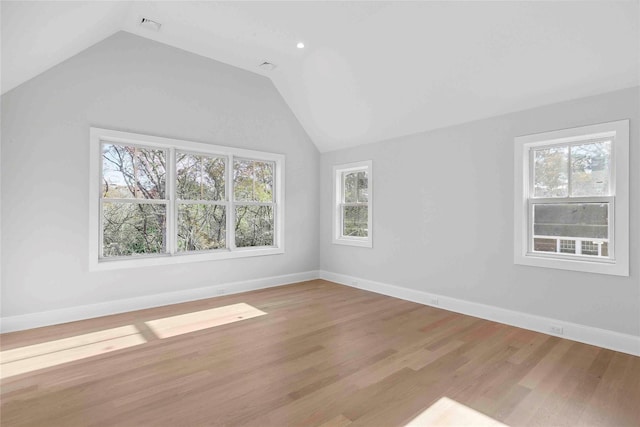 34 Old Main Rd, Quogue, NY 11959 - unfurnished room featuring healthy amount of natural light, lofted ceiling, and wood finished floors