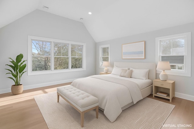 34 Old Main Rd, Quogue, NY 11959 - bedroom featuring wood finished floors and vaulted ceiling