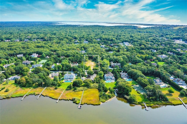 34 Old Main Rd, Quogue, NY 11959 - aerial view of property and surrounding area featuring property boundaries highlighted and a nearby body of water