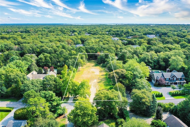 34 Old Main Rd, Quogue, NY 11959 - aerial view of property and surrounding area with a heavily wooded area and property parcel outlined