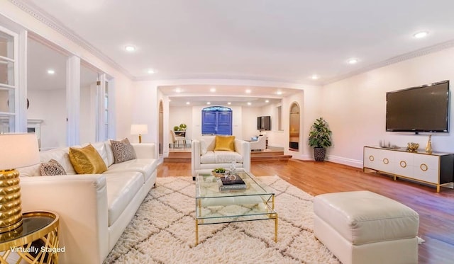 530 S Centre Island Rd, Centre Island, NY 11771 - living area featuring arched walkways, recessed lighting, and wood finished floors