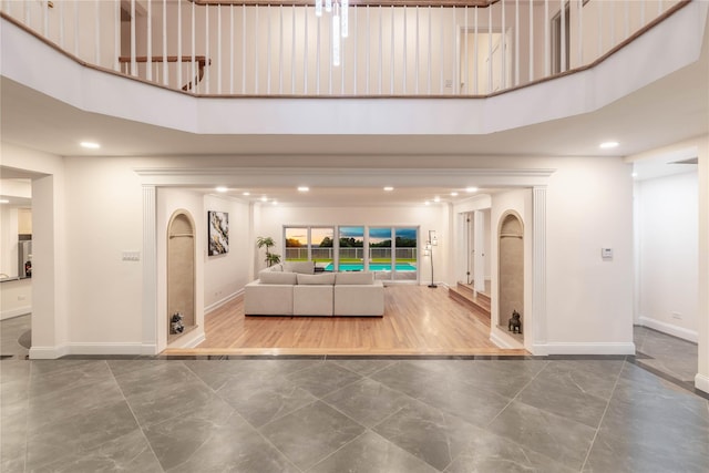 530 S Centre Island Rd, Centre Island, NY 11771 - living area with a high ceiling, marble finish flooring, and recessed lighting