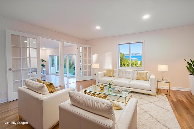 530 S Centre Island Rd, Centre Island, NY 11771 - living room featuring french doors, wood finished floors, and recessed lighting