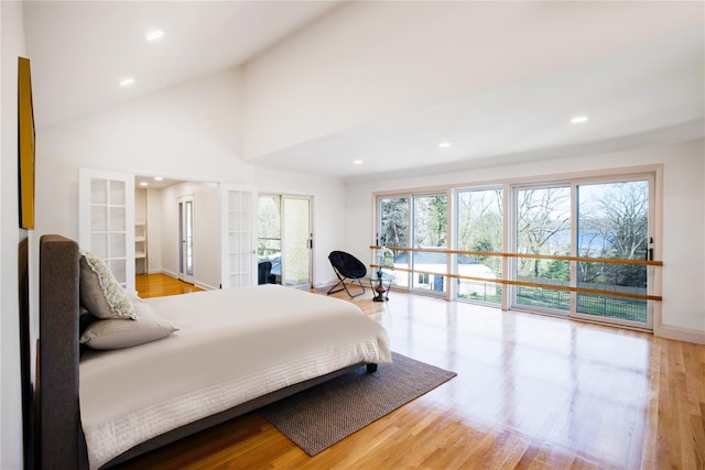 530 S Centre Island Rd, Centre Island, NY 11771 - bedroom with recessed lighting, wood finished floors, and a high ceiling
