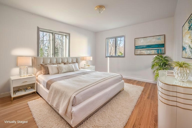 530 S Centre Island Rd, Centre Island, NY 11771 - bedroom with baseboards and light wood-style flooring