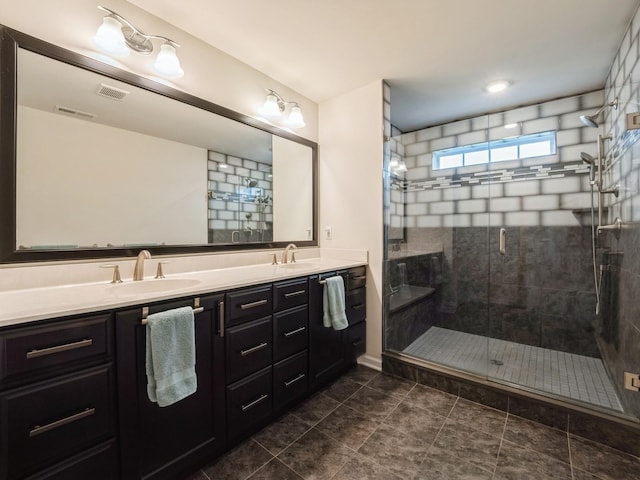 57 Lewis Rd, Hopewell Junction, NY 12533 - full bathroom featuring double vanity and a stall shower