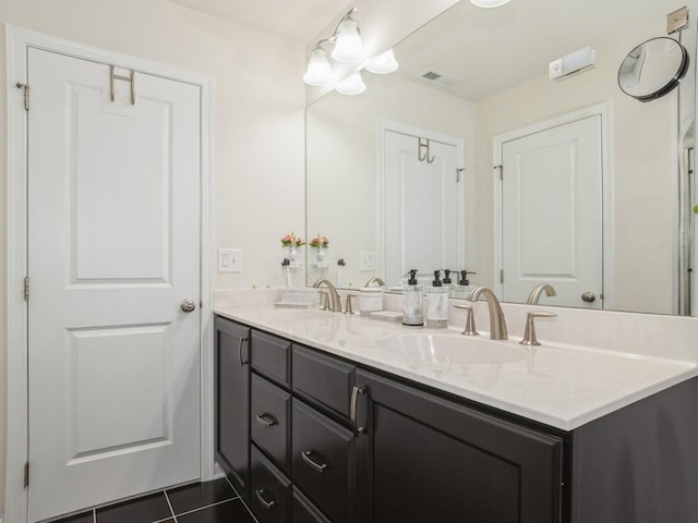 57 Lewis Rd, Hopewell Junction, NY 12533 - full bathroom with double vanity and tile patterned floors