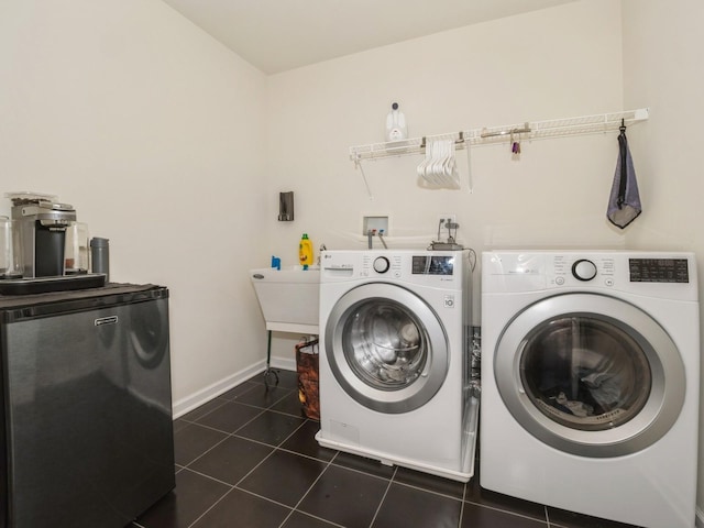 57 Lewis Rd, Hopewell Junction, NY 12533 - washroom with independent washer and dryer and dark tile patterned floors