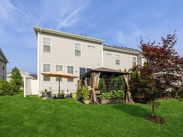 57 Lewis Rd, Hopewell Junction, NY 12533 - rear view of property featuring a gazebo and a lawn