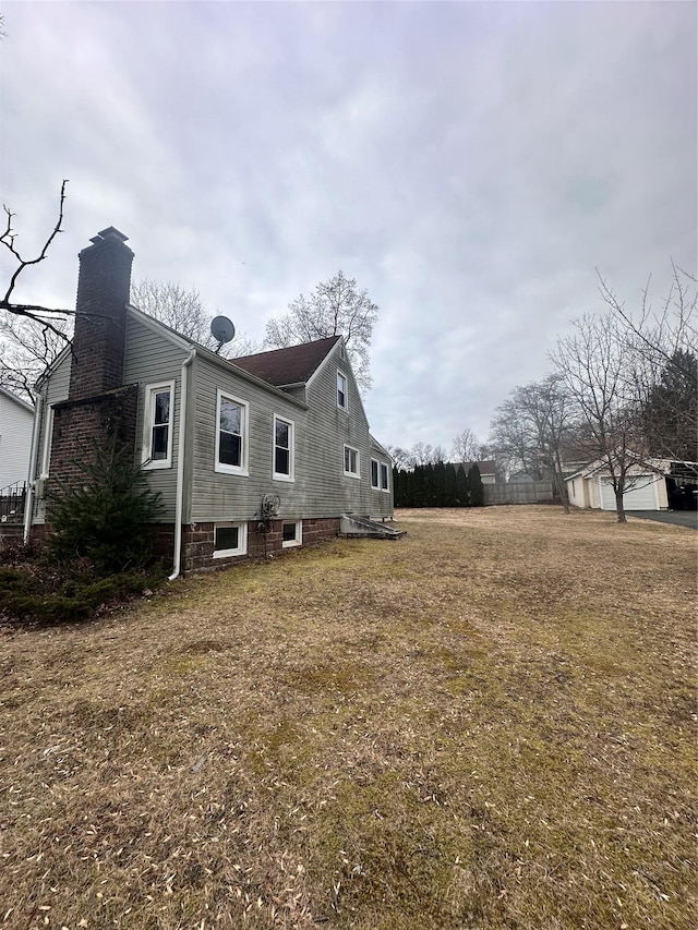 35 Lindbergh, New City, NY 10956 - view of property exterior with a chimney