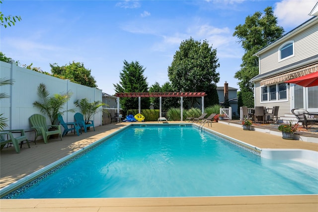 565 S 8th St, Lindenhurst, NY 11757 - view of pool featuring a wooden deck and a fenced backyard