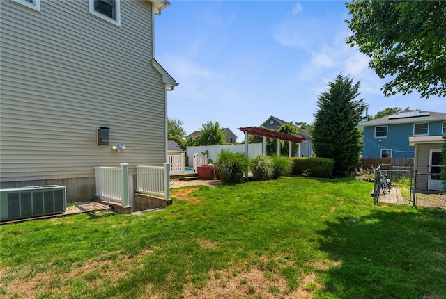 565 S 8th St, Lindenhurst, NY 11757 - view of yard featuring a deck