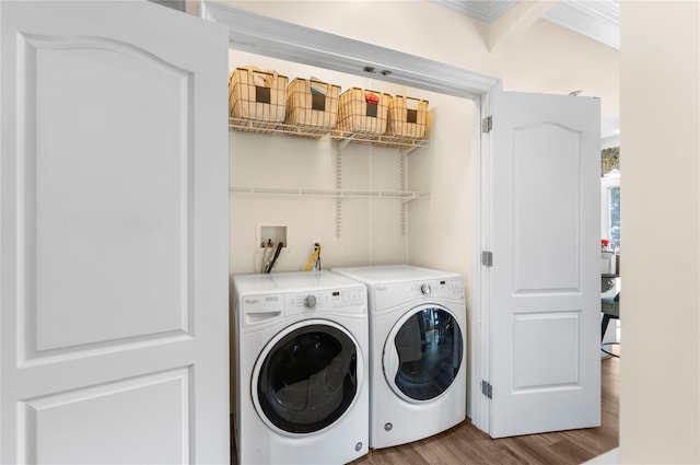 565 S 8th St, Lindenhurst, NY 11757 - laundry area featuring separate washer and dryer, wood finished floors, and crown molding