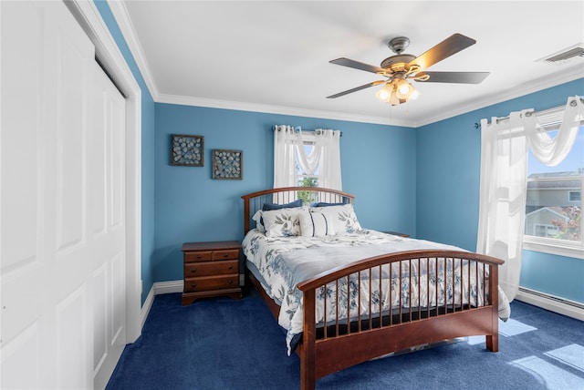 565 S 8th St, Lindenhurst, NY 11757 - carpeted bedroom with a closet, crown molding, and a ceiling fan