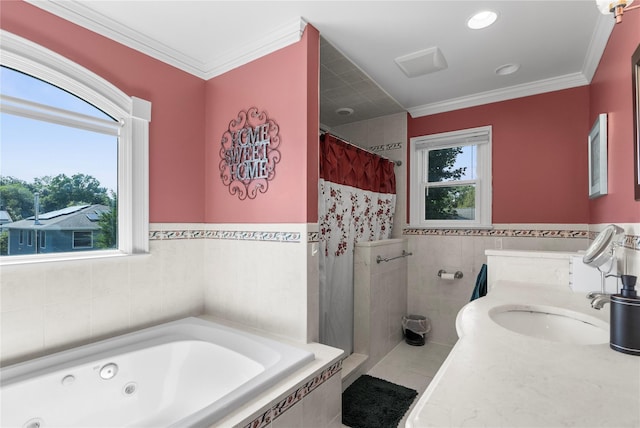 565 S 8th St, Lindenhurst, NY 11757 - bathroom featuring tile walls, a jetted tub, tiled shower, crown molding, and tile patterned flooring