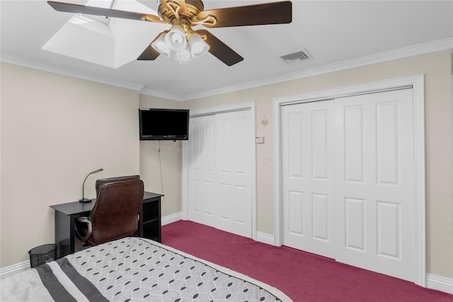 565 S 8th St, Lindenhurst, NY 11757 - carpeted bedroom featuring multiple closets, ornamental molding, a desk, and ceiling fan