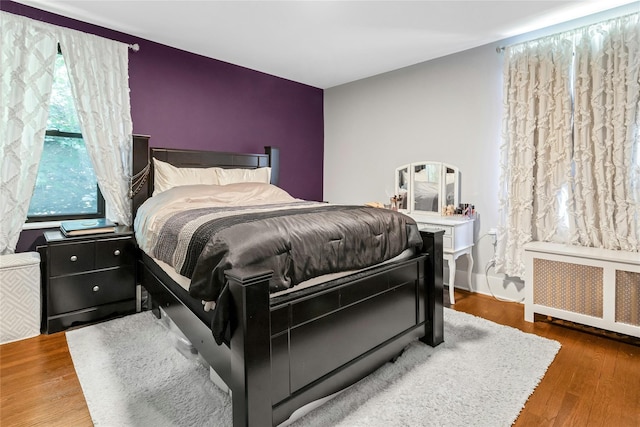 37 Central Ave Unit 2G, Hartsdale, NY 10530 - bedroom with radiator and wood finished floors