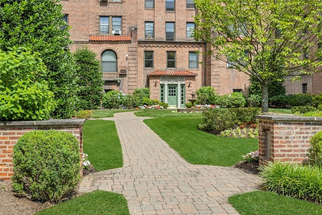 37 Central Ave Unit 2G, Hartsdale, NY 10530 - view of front of home featuring brick siding and a front lawn