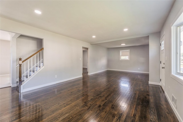 34 Klein Ave, West Nyack, NY 10994 - spare room featuring stairway, dark wood-type flooring, and recessed lighting