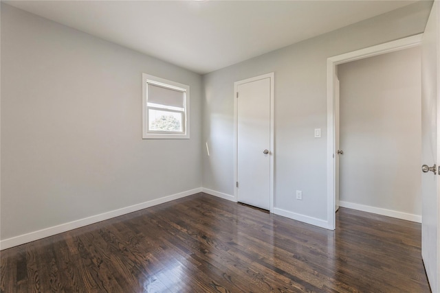 34 Klein Ave, West Nyack, NY 10994 - unfurnished bedroom with dark wood-style floors and baseboards