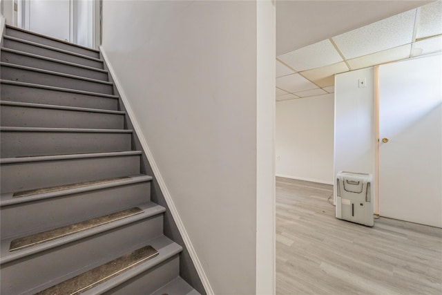 34 Klein Ave, West Nyack, NY 10994 - staircase featuring wood finished floors and a drop ceiling