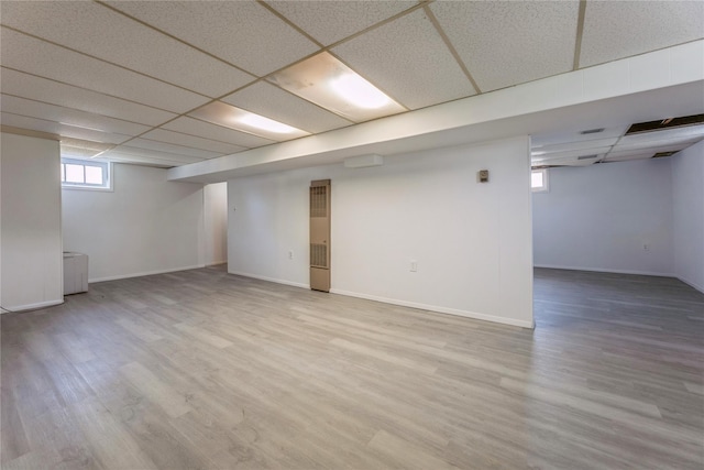 34 Klein Ave, West Nyack, NY 10994 - below grade area with a paneled ceiling and wood finished floors