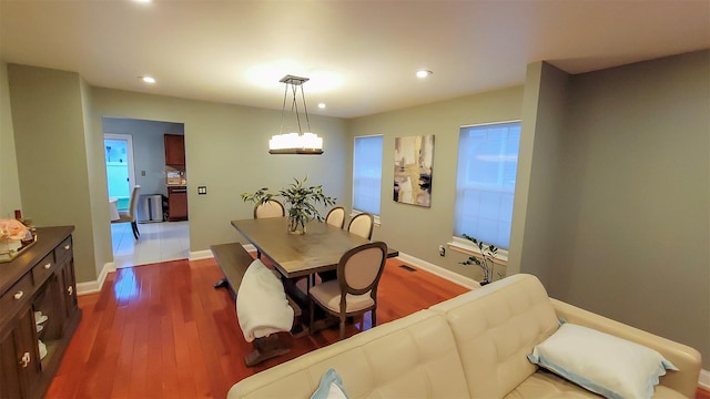 948 Orlando Ave, West Hempstead, NY 11552 - dining space featuring dark wood-style flooring and recessed lighting