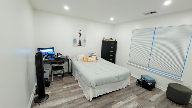 948 Orlando Ave, West Hempstead, NY 11552 - bedroom featuring light wood-style flooring and recessed lighting