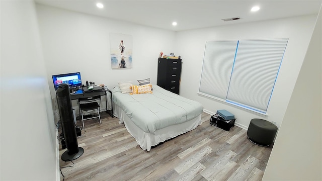 948 Orlando Ave, West Hempstead, NY 11552 - bedroom featuring light wood-type flooring and recessed lighting